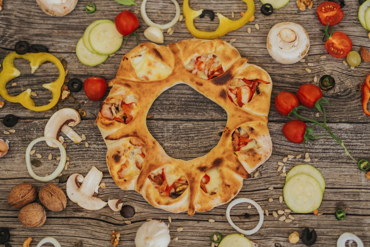 Aluatul maturat 24-48h — secretul pizzei noastre